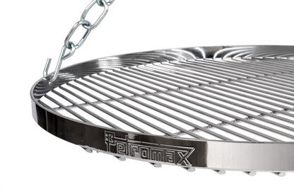 Petromax Hänge-Rost über dem Lagerfeuer am Dreibein im Einsatz